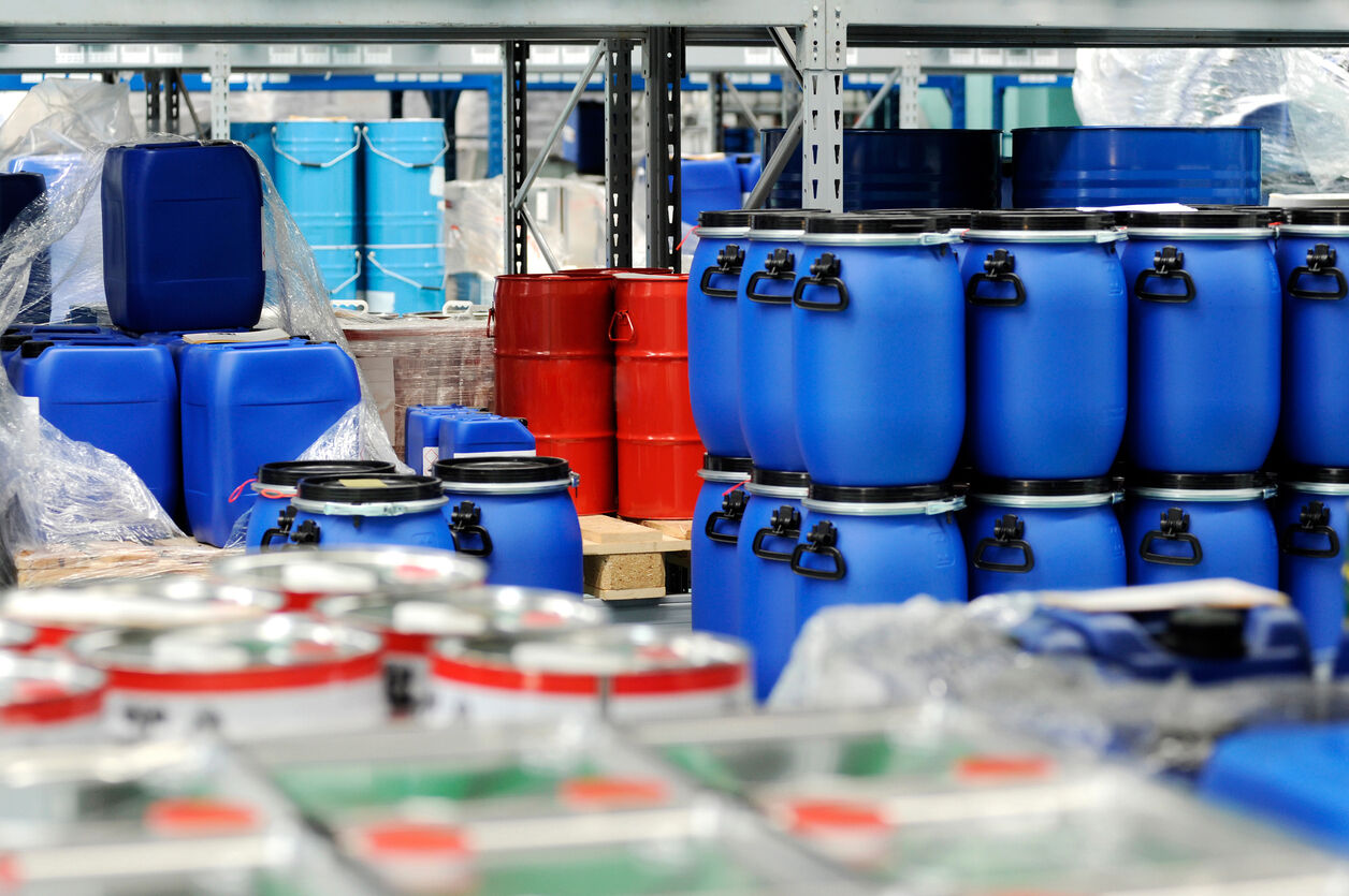 Sealed storage drums holding rare earth oxides